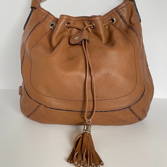 SOLD
Danier Brown Leather Hobo Bag with Tassel Closure - Picture 2 of 9